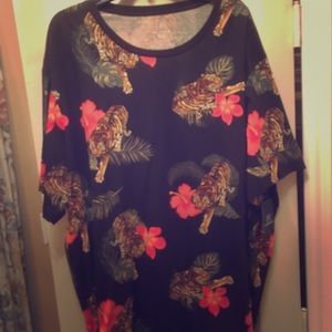 George T with tiger in flower print